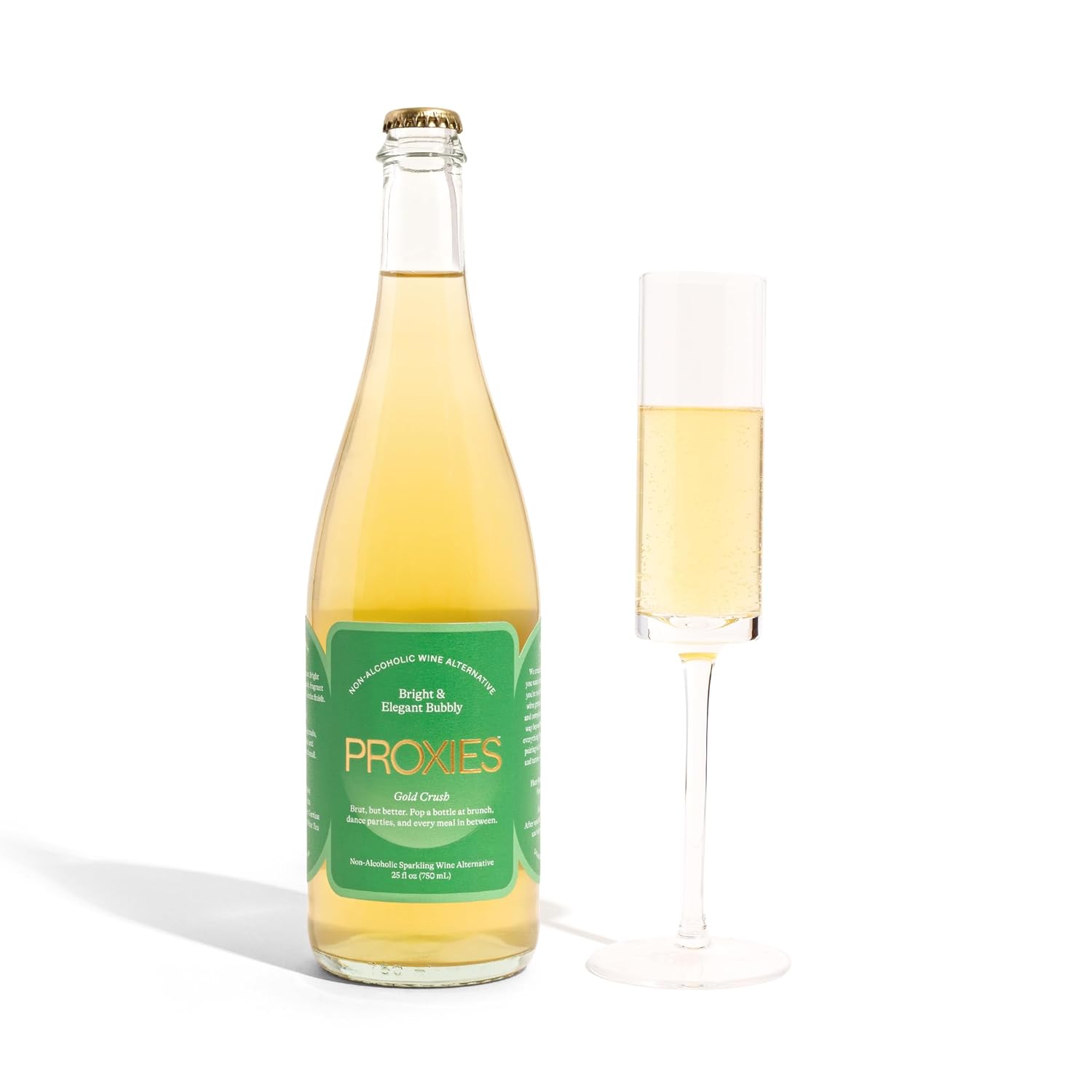 Bottle of Proxies Gold Crest sparkling wine with a glass on a white background
